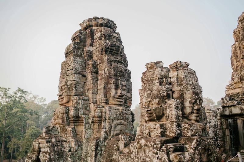 Stone-carved smiling faces of Bayon Temple in Angkor Thom
