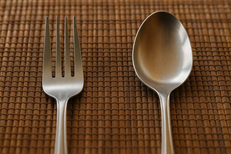 Thai dining — spoon to mouth, fork pushes food